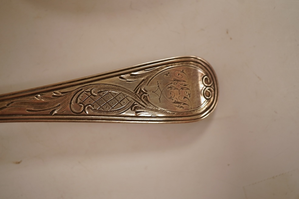 A pair of George III silver Old English pattern berry spoons, by Eley, Fearn & Chawner, London, 1810, 22.1cm, together with three Victorian silver fiddle pattern teaspoons, 6.8oz, together with a pair of plated sugar ton